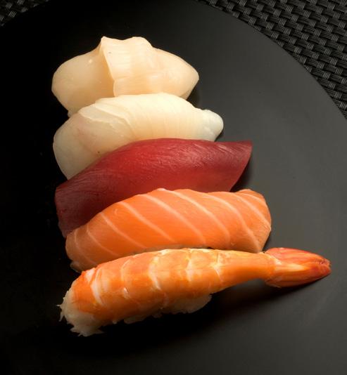 pieces of salmon, halibut, hamachi, scallops, tuna and king