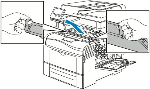 Vedlikehold d. Sett avfallskassetten på en jevn overflate. Forsiktig: Legg ikke avfallskassetten på siden slik at fargepulveret lekker ut.