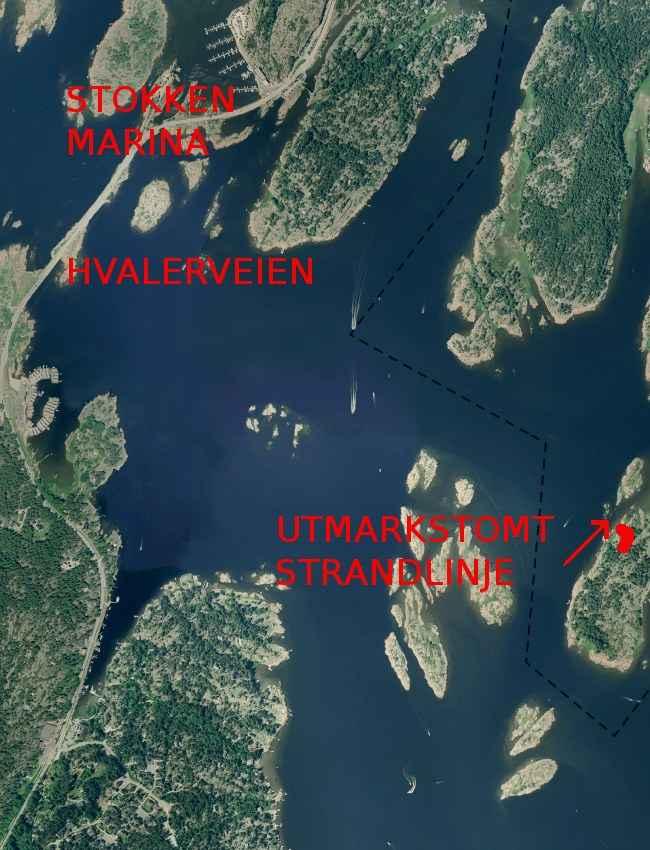 Luftfotoet over viser Stokken Marina øverst i bildet.