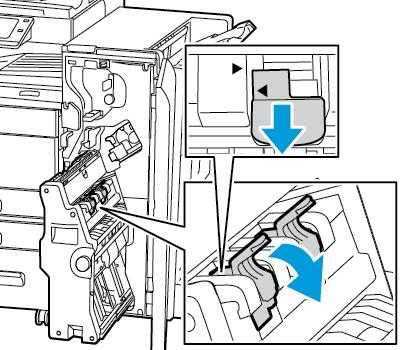 Ta tak i heftemodulhåndtaket og dra enheten mot deg til stiftkassetten vises i den øverste kanten av enheten. 3.