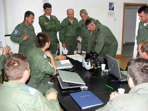 MISIUNE Pilo]i din patrula dislocabil` pus` la dispozi]ia NATO de For]ele Aeriene Rom#ne, \n sala de briefing convenirea unei solu]ii permanente (sau de lung` durat`) pentru asigurarea Poli]iei