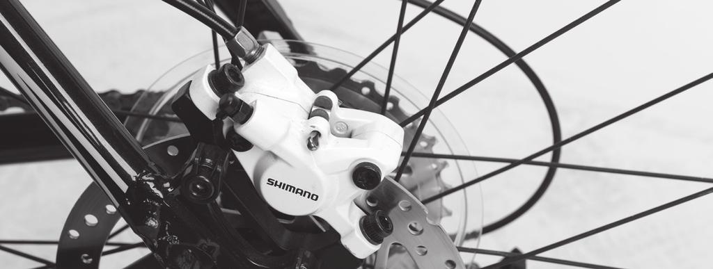 Justeringsskrue SKIVEBREMSER X-zite-sykkelen din kan være utstyrt med enten mekaniske eller hydrauliske skivebremser. Skivebremser justeres lett ved å løsne boltene som vist på bildet nedenfor.