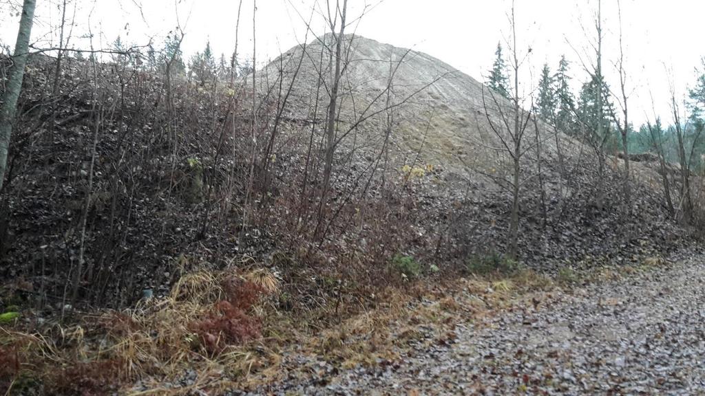 6. Hensyn til natur og omgivelser Masseuttaket er under drift og etter avslutning godt skjermet mot innsyn fra fylkesveg 40 og også fylkesveg 107 nordøst for Numedalslågen.