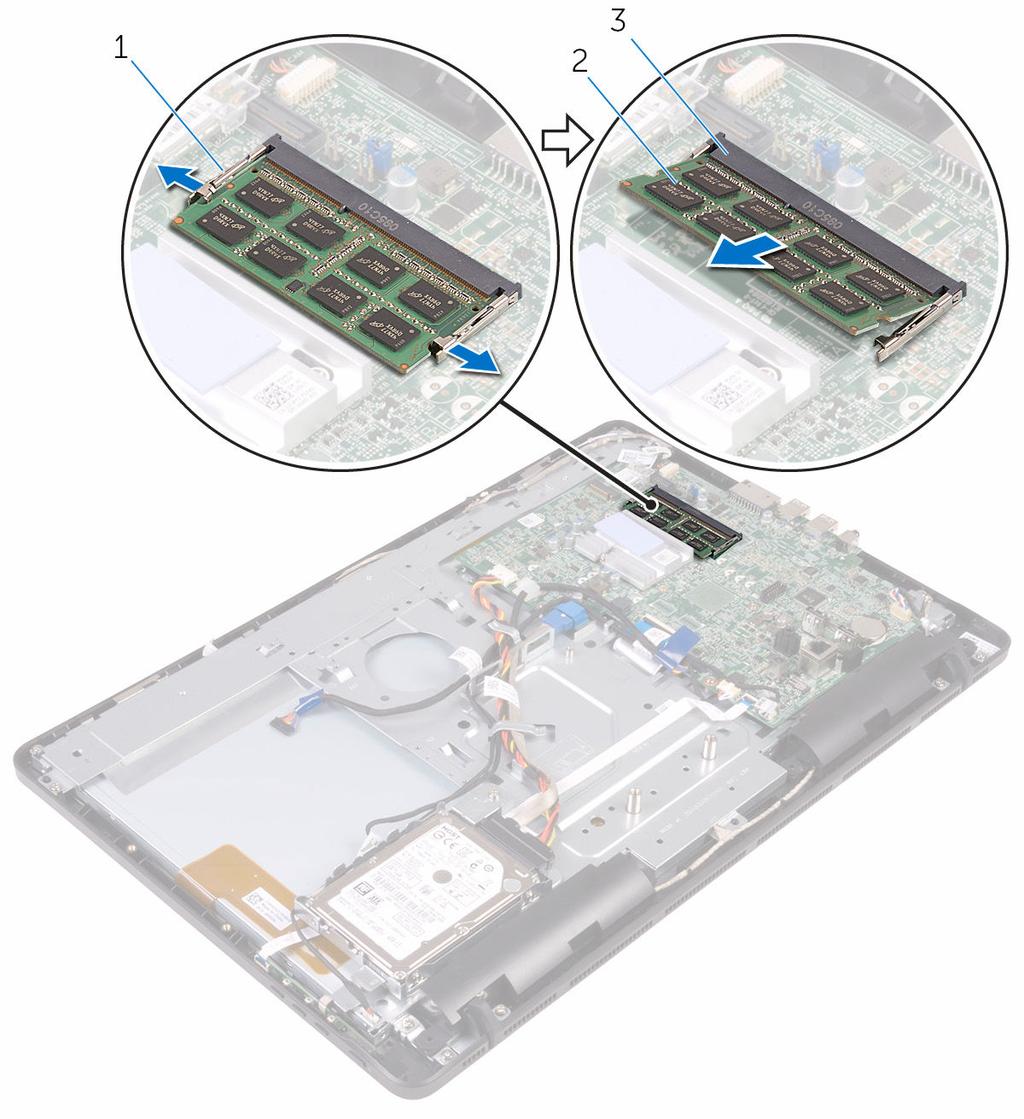 2 Skyv og ta minnemodulen ut av minnemodulsporet.