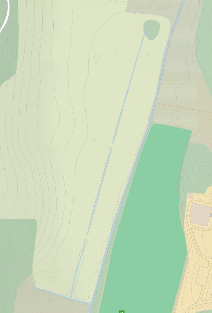 Midt på mottaksarealet er det en åpen grøft. Helt mot øst mot skogkanten er det en åpen bekk (Figur 6). Figur 6.