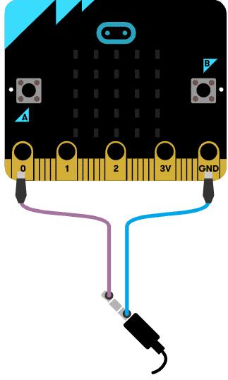 Fest den andre ledningen fra der det står GND på micro:biten til den andre pinnen på buzzeren.
