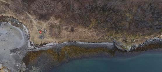 Rester etter to moloer/steinvorrer i sjø, Askeladden ID 213199-6 - 7 (fra nord til sør) Steinvorrer på hhv. 2 x 21 meter og 3 x 14 meter.