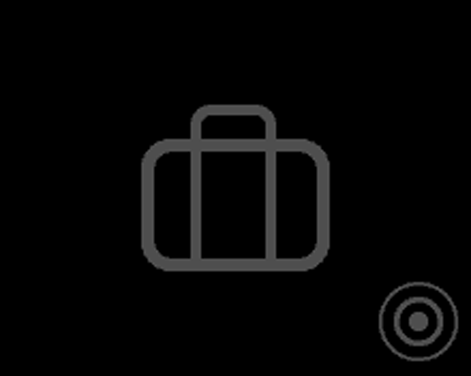 Et koffertsymbol vises på displayet på den angitte startdatoen.