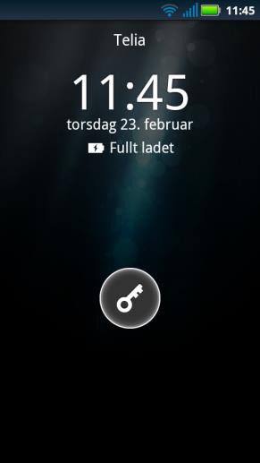 Handi Defy+ starter og bildet med skjermlås vises. For å åpne skjermlåsen peker man på låsesymbolet med fingeren og drar mot høyre.