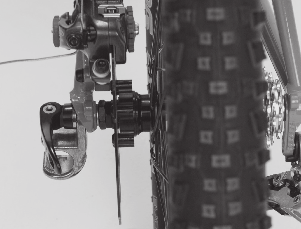 Lukk hurtigutløserspaken (se bilde 3). L. Kontroller at sykkelhjulet er skikkelig festet til sykkelen ved å trekke bestemt i det.