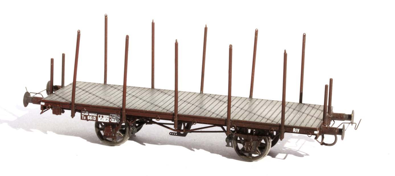 I 1916 begynte NSB å bygge T-vogner med nedleggbare jernlemmer. Når jernlemmene var slått opp, dannet de en kasse. Vogntypen var i virkeligheten en kombinert stakevogn, kassevogn og plattformvogn.