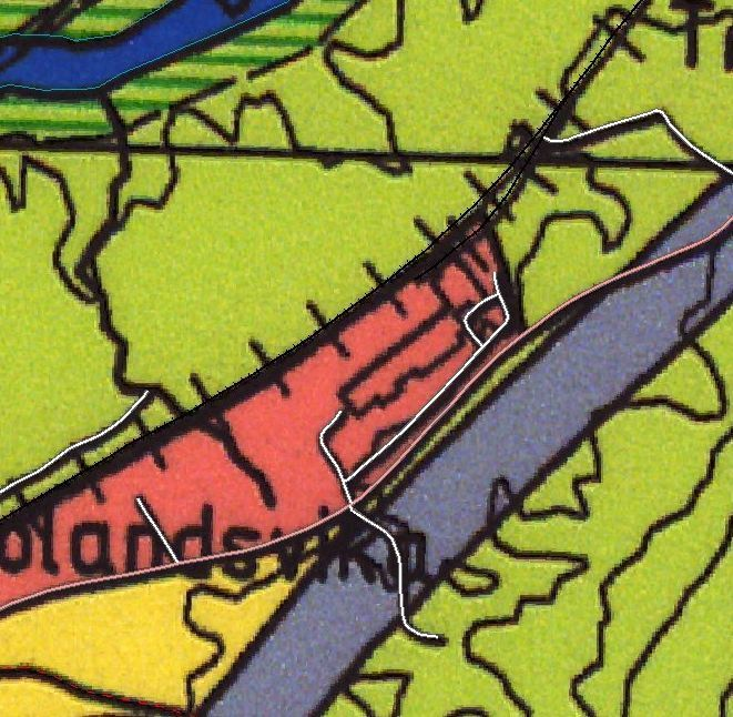 del av industriområdet. Bygningsmassen på tomta er krysset ut av planen og tomtegrensene foreslås opphevet.