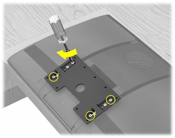 Fest VESA-adapterplaten på baksiden av datamaskinen, og bruk en