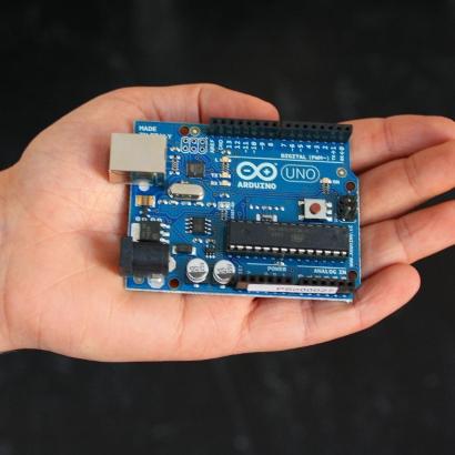 The microcontroller on the board is programmed using the Arduino programming language.