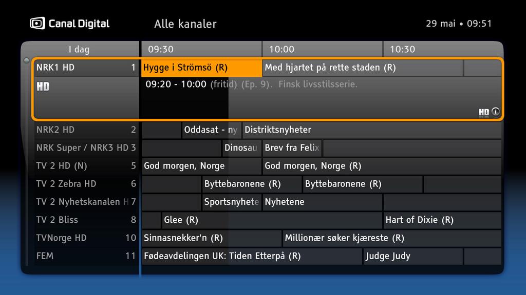 Åpne TV-guiden ved å trykke på på fjernkontrollen.