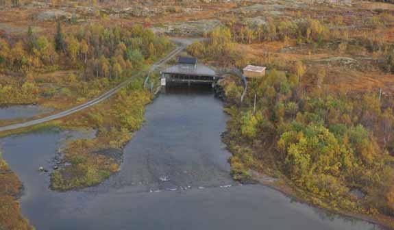 Foto 7 Inntak Elsvatnet Østre Fisklausvatnet kan reguleres 1 meter og er overført til Lille Røssvatnet. Herfra renner vannet ut i Røssvatnet (Vedleggskart Hattfjelldal).