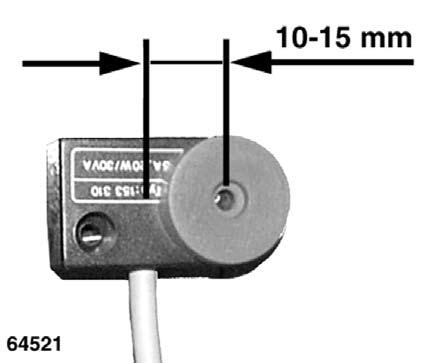 HOOLDUS Magnetlüliti seadistamine (alates masinanumbrist 605 0 1113) Põhiveermikule on paigaldatud ohutusmehhanismina magnetlüliti.