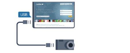 Du kan vise bilder eller spille av musikk og videoer fra en USB-minneenhet. Sett inn en USB-flash-stasjon i en av USB -tilkoblingene på TVen mens TVen er på. 2.