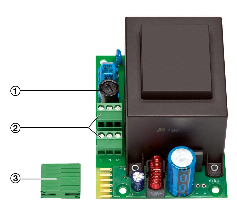 1 Primary fuse 2 Connection terminals for supply voltage