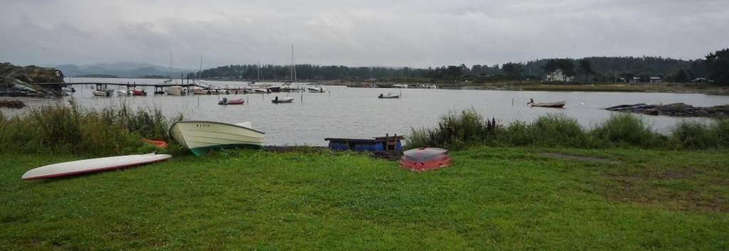 august 2009 etter stormen 31. juli. En rekke båter ble tatt opp før og under stormen. Brygge som ønskes fornyet til venstre i bildet.