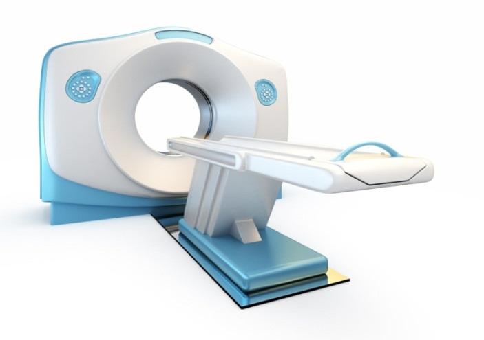 Figur 1: CT-scanner med pasientbord og gantry. Foto: colourbox.com CT-scanneren består, som figur 1 viser, av en kasseformet enhet som kalles gantry, og et bevegelig bord som pasienten plasseres på.