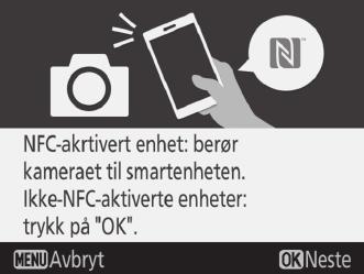 For å koble til ved hjelp av NFC, hold smartenhetens NFC-antenne inntil kameraets logo (N-mark), vent deretter på at SnapBridge-appen starter og fortsett til trinn 7.