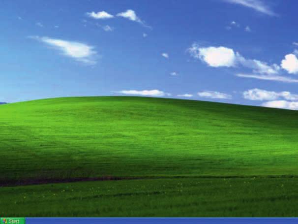 Windows XP med det karakteristiske bakgrunnsbildet av jord og himmel kom på