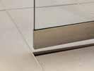 Flenser i både vegg og gulv sikrer en 100 % vanntett løsning, og flisene skjuler elegant den sterke, bakenforliggende installasjonen.