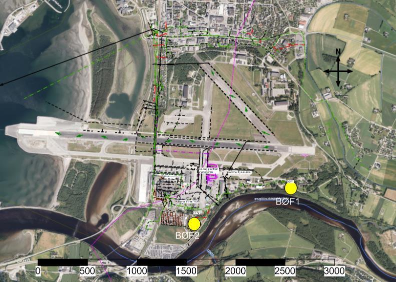 Figur 7-1. Grøfter og overvannsledninger på Værnes lufthavn vises med sort. Rosa sirkler er snødeponier. Grønne piler viser retning avrenning fra rullebanen. Grønn stiplet linje er spillvann.
