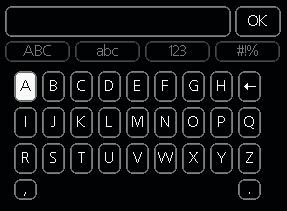 I visse menyer der det kan være nødvendig å legge inn tekst, finnes det et virtuelt tastatur. Du får tilgang til ulike tegnoppsett, avhengig av meny, og disse velger du ved hjelp av betjeningsrattet.