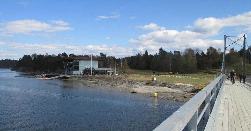 Figur V6: Illustrasjon som vise ønsket utvidelse av båthallen sett fra Kalvøyabroa.