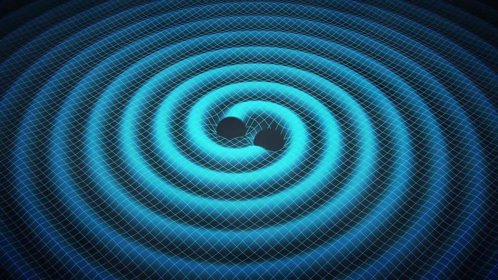 Et system med to svarte hull i bane rundt hverandre, sender ut gravitasjonsbølger med frekvens lik det dobbelte