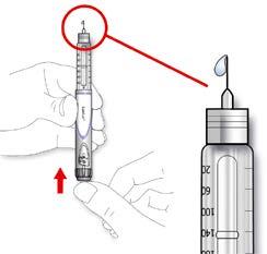 E. Trykk injeksjonsknappen helt inn. Kontroller at insulin kommer ut av kanylespissen. Det er mulig du må utføre sikkerhetstesten flere ganger før insulin kommer til syne.