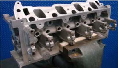 Reparasjon av tennpluggjenger i Ford Triton sylindertopper.