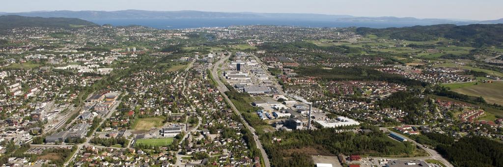 Hensikten med planarbeidet er å forbedre forbindelsen mellom terrengplatåene med de folkerike bydelene Saupstad/Kolstad/Huseby vest for Bjørndalen (6000 innbyggere i dag)og Rosten (650) og Tiller