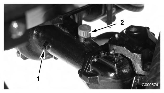 Sett maskinen på en jevn flate med hjulene slik at tappepluggen (Figur 45) står på laveste stilling (klokken seks). 1. Kontroll-/tappeplugg Figur 45 5.