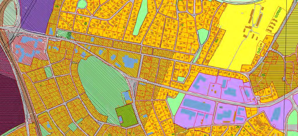 Figur 2-3: Utklipp som viser formål og hensynssoner i kommuneplanens arealdel for området Hafslund-Borgen. Grått veg, parkering, rosa off./priv.