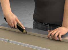 Merk Proteck-komponenten mens den ligger flatt, bruk en rett kant og en tapetkniv til å kutte langs den