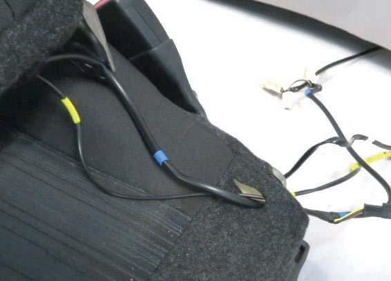 Pass the side airbag harness () and seat back heater